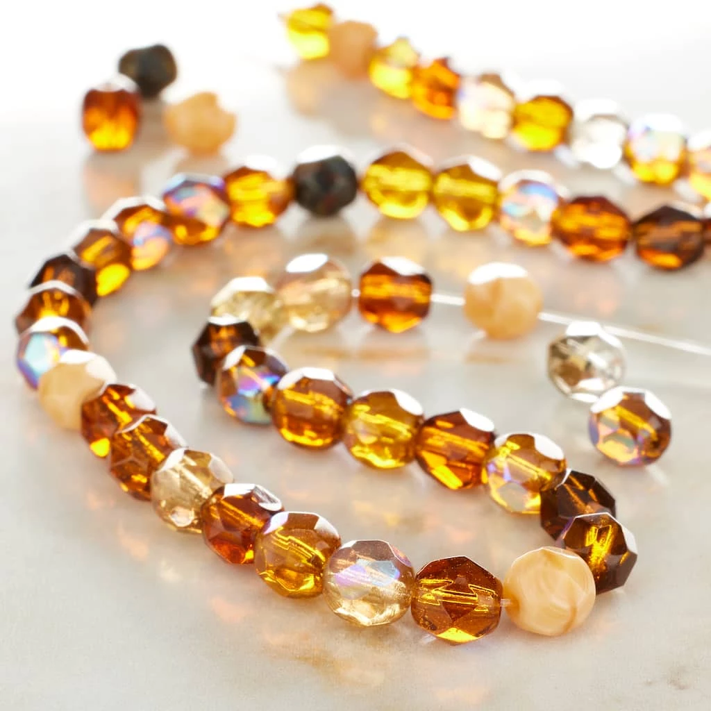 Discount ๐ Buy ๐ 12 Pack: Bead Gallery® Amber Mix Faceted Czech Glass Round Beads, 6mm ๐ ๐คฉ 4 Discount ๐ Buy ๐ 12 Pack: Bead Gallery® Amber Mix Faceted Czech Glass Round Beads, 6mm ๐ ๐คฉ - Image 2